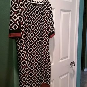 Pretty new dress in black brown and white. Size 16